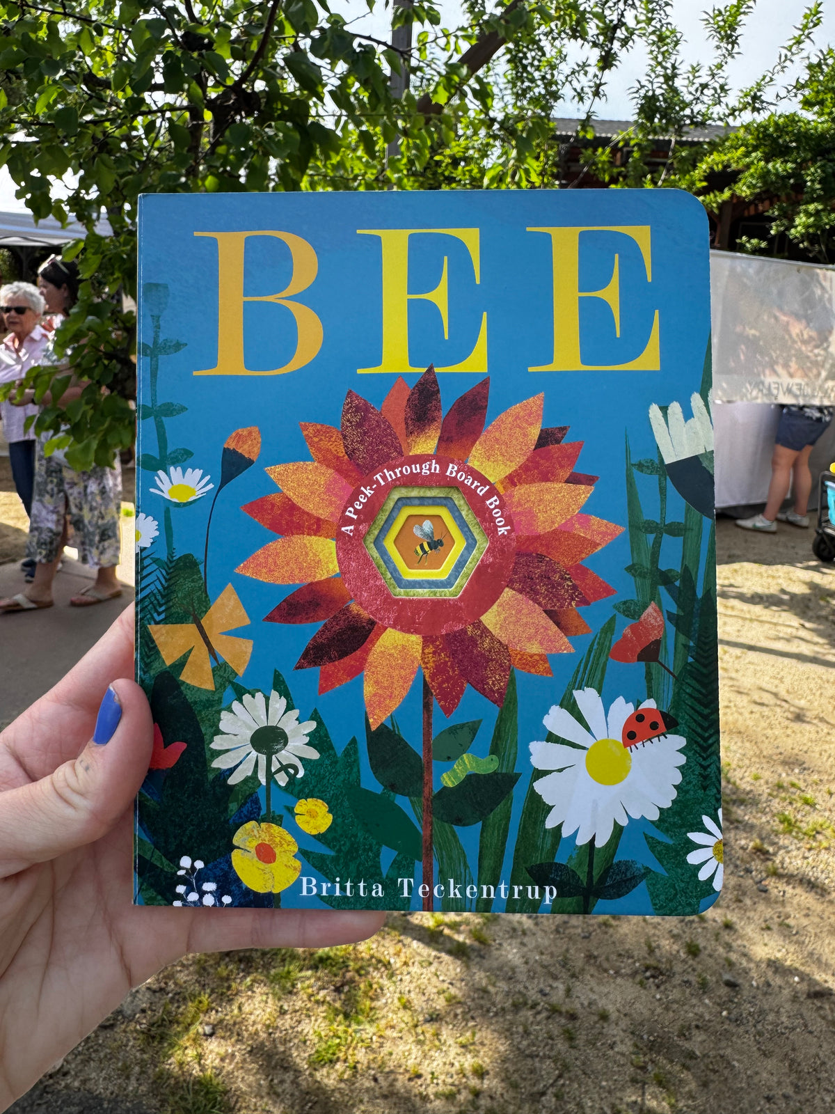 Bee: A Peek Through Board Book